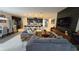 Open-concept living area with a seamless flow between living room, dining, and kitchen spaces at 1731 Caribbean View Ter, Kissimmee, FL 34747