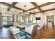 Community lounge area featuring coffered ceiling, stylish furnishings, and an abundance of natural light at 1731 Caribbean View Ter, Kissimmee, FL 34747