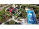 An aerial view of a playground and the 'Solara Flowrider' which is an artificial wave surfing attraction at 1731 Caribbean View Ter, Kissimmee, FL 34747
