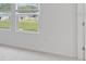 Bright bedroom with large windows at 185 River Front Way, Edgewater, FL 32141