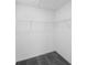 Inside the walk-in closet with shelving, providing ample storage in a new home at 185 River Front Way, Edgewater, FL 32141
