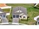 Aerial view of a single-Gathering home and manicured lawn at 2012 Keystone Pass Blvd, Minneola, FL 34715