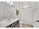 Bathroom featuring modern fixtures, vanity with sink, and shower with curtain at 2012 Keystone Pass Blvd, Minneola, FL 34715