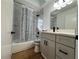 Updated bathroom featuring a shower-tub combination and modern vanity at 2013 Bates Ave, Eustis, FL 32726