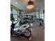Well-equipped gym featuring modern cardio machines and weight training equipment at 2369 Palm Park Loop, Clermont, FL 34714