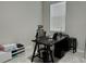 Home office with desk, chair, modern decor, and ample natural light at 2369 Palm Park Loop, Clermont, FL 34714