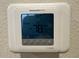 Honeywell Home thermostat displaying the current temperature at 2369 Palm Park Loop, Clermont, FL 34714
