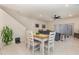 Bright dining area with natural light and stylish furnishings at 2623 Buena View Rd, Kissimmee, FL 34746