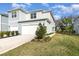 Beautiful two-story home with a well-manicured lawn at 2623 Buena View Rd, Kissimmee, FL 34746