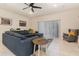 Comfortable living room featuring a large sectional sofa at 2623 Buena View Rd, Kissimmee, FL 34746
