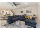 Living room featuring a sectional sofa, side tables and decor at 2623 Buena View Rd, Kissimmee, FL 34746
