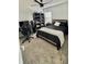Comfortable bedroom with carpet, neutral decor, and a large desk, ideal for a home office at 313 Estates Ct, Haines City, FL 33844