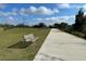 Enjoy the outdoors with a park bench along the community walking path at 313 Estates Ct, Haines City, FL 33844