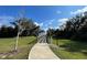 Scenic walkway leading to water views, perfect for enjoying nature in this community at 313 Estates Ct, Haines City, FL 33844
