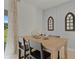 Charming dining room with natural wood table and modern decor at 3350 Private Oak Dr, Apopka, FL 32703