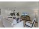 Spacious open concept living room features a modern design with adjacent kitchen and dining areas at 3350 Private Oak Dr, Apopka, FL 32703