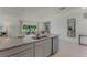 Bright open kitchen with granite countertops and stainless steel appliances at 3368 Private Oak Dr, Apopka, FL 32703