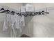 Walk-in closet with wire shelving and two white robes at 3368 Private Oak Dr, Apopka, FL 32703