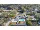 Aerial view of home showing fenced backyard, swimming pool, rear patio and tree-lined street at 345 Overstreet Ave, Longwood, FL 32750