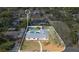 Aerial view of home showing fenced backyard, swimming pool, rear patio, garage and tree-lined street at 345 Overstreet Ave, Longwood, FL 32750