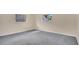 Neutral bedroom featuring carpet, natural light from the window and base trim at 345 Overstreet Ave, Longwood, FL 32750