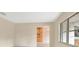 Bright and airy living room showcasing a large window at 345 Overstreet Ave, Longwood, FL 32750