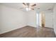 Bright bedroom featuring modern flooring and a large closet at 38934 Merrell Ave, Umatilla, FL 32784