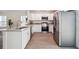 Modern kitchen featuring stainless steel appliances, granite countertops, and modern cabinetry at 38934 Merrell Ave, Umatilla, FL 32784