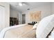 Bedroom features ceiling fan, built-in bookcase, grand piano, and a wall-mounted map at 4008 San Gallo Dr # 102, Kissimmee, FL 34741