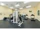 Bright fitness center featuring a treadmill, elliptical machine, and weight training equipment at 4008 San Gallo Dr # 102, Kissimmee, FL 34741