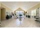 Well-lit community lobby with seating, plants and tile flooring at 4008 San Gallo Dr # 102, Kissimmee, FL 34741