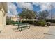 Community picnic area with lush greenery and grilling stations at 4008 San Gallo Dr # 102, Kissimmee, FL 34741
