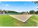 Sand volleyball court with white borders, ready for recreational games and outdoor fun at 4008 San Gallo Dr # 102, Kissimmee, FL 34741
