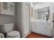 Bright bathroom with white vanity, updated fixtures, and a glass enclosed shower at 407 W 1St Ave, Windermere, FL 34786