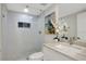 Bathroom featuring a glass-enclosed shower, stylish vanity, and elegant decor at 4651 S Atlantic Ave # 3060, Ponce Inlet, FL 32127