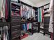 Walk-in closet with custom shelving and storage solutions at 4903 Eastlake Vista Dr, St Cloud, FL 34771