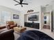 Cozy living room features comfortable seating, a modern TV console, and stylish decor at 4903 Eastlake Vista Dr, St Cloud, FL 34771
