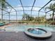 Beautiful pool with a built-in spa and picturesque lake views at 4903 Eastlake Vista Dr, St Cloud, FL 34771