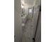 Bright bathroom featuring dual sink vanity, marble floors, and modern fixtures at 50 Avalon Ct, Casselberry, FL 32707