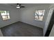 Bedroom with modern floors and windows offering natural light at 50 Avalon Ct, Casselberry, FL 32707