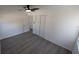 Bedroom with modern floors, large closet and doors leading to other rooms at 50 Avalon Ct, Casselberry, FL 32707