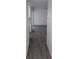 Hallway view showcasing new paint and luxury vinyl plank flooring at 50 Avalon Ct, Casselberry, FL 32707