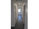 Hallway with modern floors leading to various rooms in the home at 50 Avalon Ct, Casselberry, FL 32707