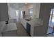 Gorgeous kitchen with stainless steel appliances, countertops and a stylish backsplash at 50 Avalon Ct, Casselberry, FL 32707