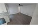 Open-plan living space with modern flooring and plenty of natural light at 50 Avalon Ct, Casselberry, FL 32707