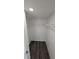 Walk-in closet with modern gray floors and wire shelving for storage at 50 Avalon Ct, Casselberry, FL 32707