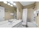 Bathroom with a vanity with double sinks, tile floors, and combined shower and tub at 5076 Tideview Cir # 90, Orlando, FL 32819