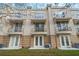 Exterior of the building with balconies and well-kept landscaping, enhancing the visual appeal of the property at 5076 Tideview Cir # 90, Orlando, FL 32819