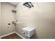 Spacious walk-in closet featuring wire shelving for storage and a safe at 5076 Tideview Cir # 90, Orlando, FL 32819