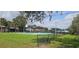 Community playground featuring basketball courts, pavilions and other play equipment surrounded by greenery at 513 Seasons Ct, Winter Springs, FL 32708
